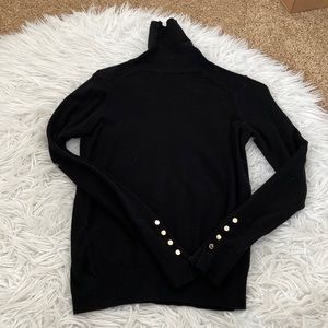 Black turtleneck sweater